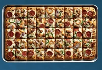 Catering tray with square pizza slices
